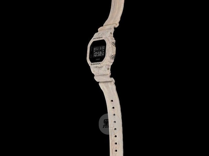 CASIO DW-5600WM-5DR G-SHOCK 指針式黑色錶盤男裝手錶 - 側面圖,黑色背景